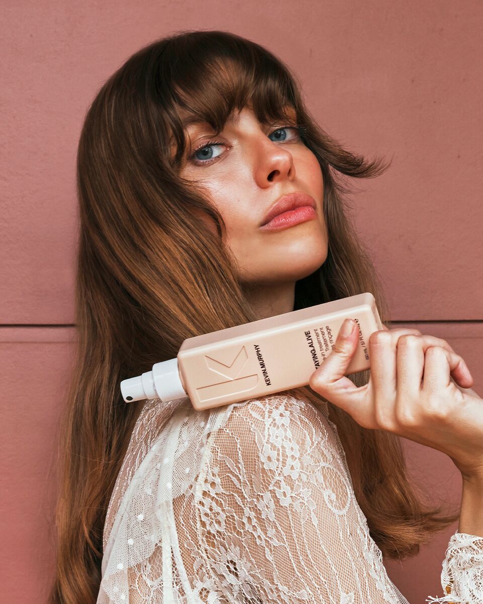 girl holding Kevin.murphy